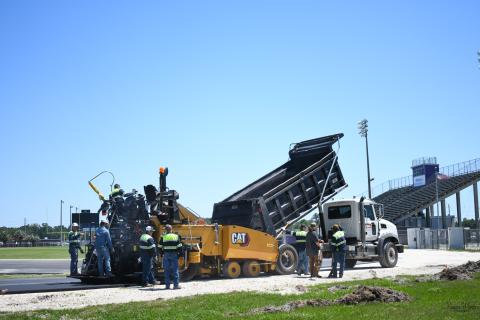 Crews from C.A. Boone Construction and Bubba’s Site Prep work on Columbia High’s track at Tiger Stadium. (COURTESY)
