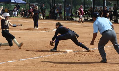 Branford shortstop Cloey Criggall is called for obstruction after tagging out Liberty County second baseman Gabriella Flowers during Wednesday’s Class 1A state championship game at Legends Way Ballfields in Clermont. (MORGAN MCMULLEN/Lake City Reporter)