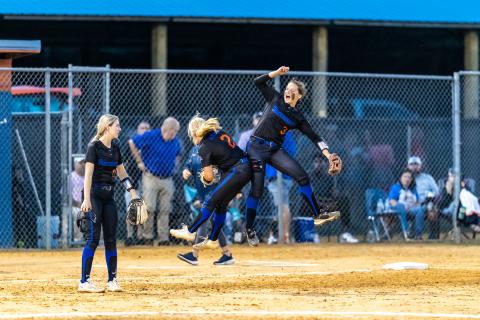 Branford pitcher Laila Arnold (left) celebrates with shortstop Cloey Criggall after the Buccaneers topped Aucilla Christian 2-0 to advance to the Class 1A Final Four. (JACK HOWDESHELL/Special to the Reporter)