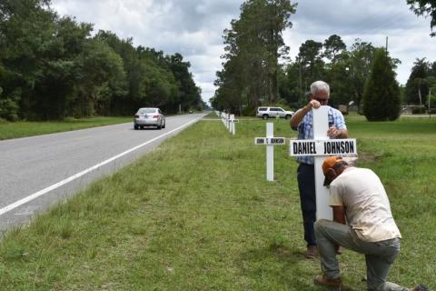 Marvin Buchanan and other volunteers with the Day Heritage Center plan on placing the crosses for Memorial Day, the Fourth of July and Veterans Day each year. (COURTESY)