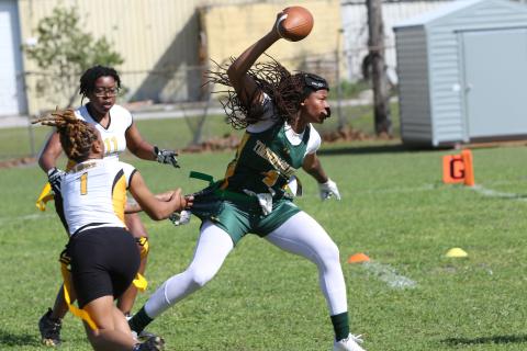 FGC receiver Destiny Lockett splits a pair of Xavier defenders on Feb. 25. (JAMIE WACHTER/Lake City Reporter)