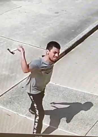 An unidentified man smashed out a side window at the Columbia Courthouse Annex on Friday by throwing a hammer through it. He also broke a window on a county employee’s car with the hammer. If you recognize this man, call the Lake City Police Department at 386-752-4343. (COURTESY)