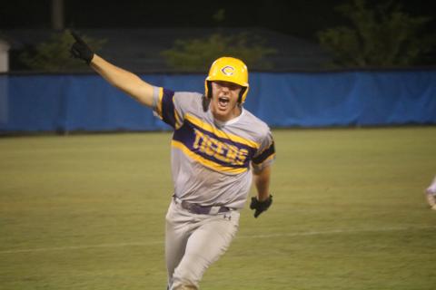 Columbia’s Ayden Phillips celebrates as he approaches third base on his grand slam in the seventh inning Tuesday at Clay. (JORDAN KROEGER/Lake City Reporter)