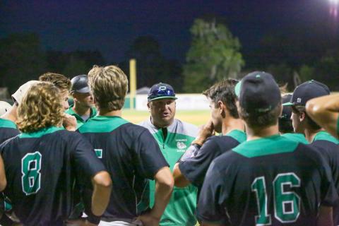 Suwannee head coach Justin Bruce speaks to his team during the Region 1-4A quarterfinals against Baker County on May 11, 2022. (BRENT KUYKENDALL/Lake City Reporter)