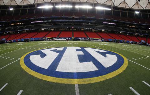 The SEC logo is displayed on the field ahead of the SEC championship game between Alabama and Missouri on Dec. 5, 2014, in Atlanta. (AP File)