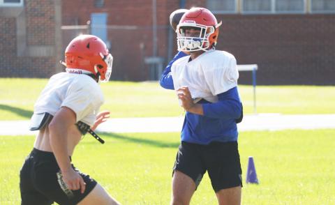 Branford quarterback Thomas Sikes throws a pass during Thursday’s practice. (JAMIE WACHTER/Lake City Reporter)