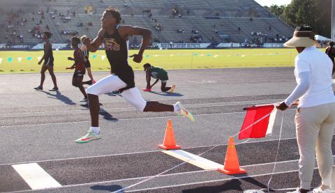 Columbia’s Seth Stockton competes in the triple jump at the Region 1-3A meet on Thursday. Stockton won the title with a leap of 14.66m. (COURTESY)