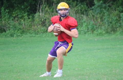 Columbia quarterback Evan Umstead drops back to pass during practice on Wednesday. (JORDAN KROEGER/Lake City Reporter)