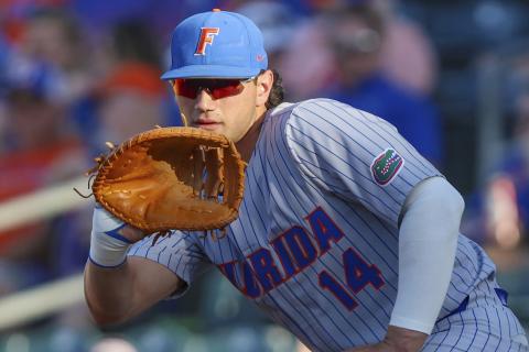 Florida's Jac Caglianone (14) waits for a throw to first during a game against Florida State on May 2 in Jacksonville. (GARY MCCULLOUGH/AP File)
