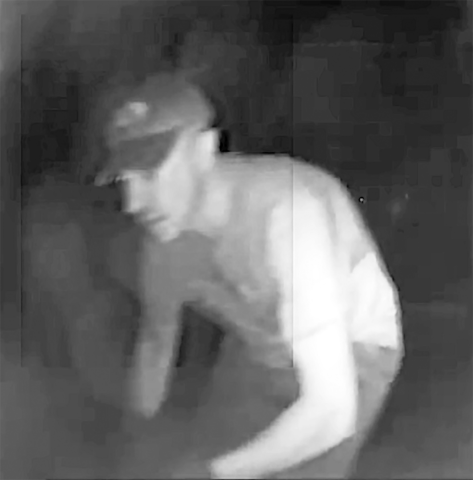 A potential suspect is shown in video surveillance from a semi-tractor that had its tires punctured. (COURTESY)