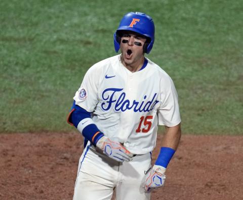 Florida's BT Riopelle celebrates his solo home run against South Carolina during the sixth inning of Friday's super regional opener in Gainesville. (JOHN RAOUX/Associated Press)