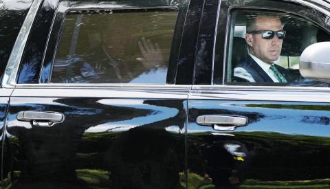 Former President Donald Trump leaves Trump National Doral resort on Tuesday in Doral on his way to Federal Court. (JIM RASSOL/Associated Press)