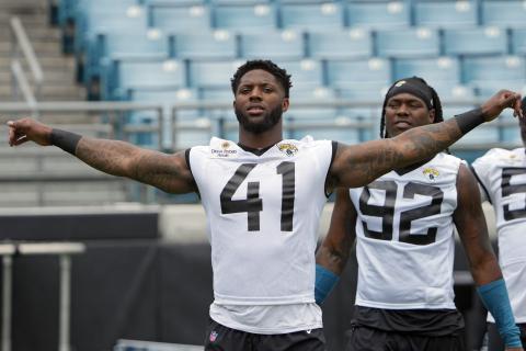 Jacksonville Jaguars linebacker Josh Allen loosens up before practice on Monday in Jacksonville. (JOHN RAOUX/Associated Press)