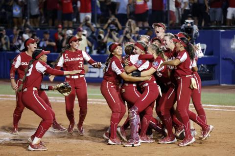 Oklahoma players celebrate after winning the Women's College World Series championship series over Florida State on Thursday in Oklahoma City. (NATE BILLINGS/Associated Press)