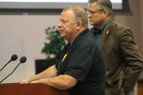 Lake City Police Chief Gerald Butler answers questions from the Columbia County Commission about consolidating dispatch Thursday as Sheriff Mark Hunter looks on. (JAMIE WACHTER/Lake City Reporter)
