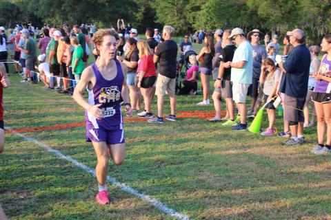 Columbia's Nathan Matsubara runs at the Cecil Field Summer Classic on Friday. (COURTESY)