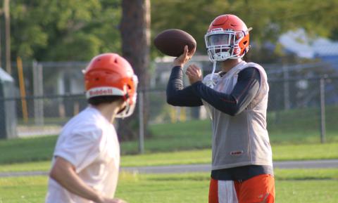 Branford quarterback Thomas Sikes throws a pass during Monday’s practice. (JAMIE WACHTER/Lake City Reporter)