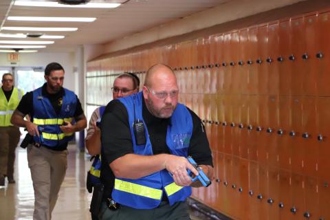 First responders walk through the halls of Columbia High School during an active shooter training this week. (COURTESY)