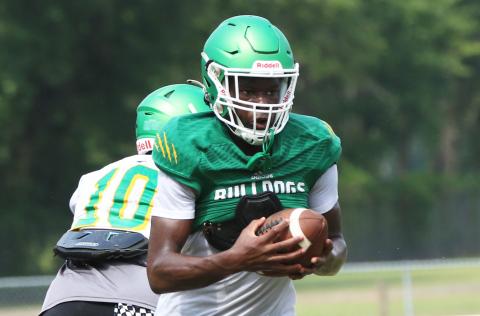 Suwannee receiver MJ Rossin runs up the field after a catch during Friday’s practice. (JAMIE WACHTER/Lake City Reporter)