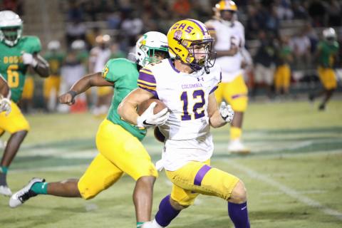 Columbia receiver Camdon Frier runs up the field after a catch against DeLand last Friday. (BRENT KUYKENDALL/Lake City Reporter)