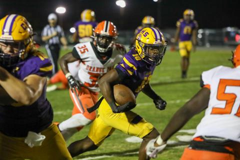 Columbia receiver Zamarion Jones runs up the field after a catch against Orange Park on Friday. Jones caught one of five touchdown passes from freshman quarterback Xavier Collins. (BRENT KUYKENDALL/Lake City Reporter)