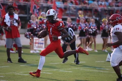 Fort White running back Dakota Fisher heads to the end zone on one of his three touchdowns Friday night against Hamilton County. (PAUL BUCHANAN/Special to the Reporter)