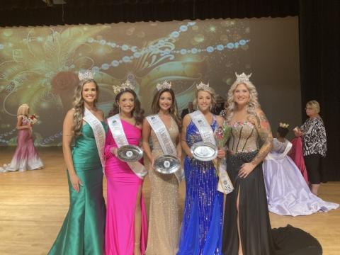 Three locals won titles at the U.S. National Forestry Pageant on Saturday in Tifton, Ga. Pictured are Manda Perry (Miss U.S. National Forestry 2022), from left, Mikah McCoy (Miss U.S. National Turpentine 2023), Lindsey Langston (Miss U.S. National Forestry 2023), Ashley Douylliez (Ms. U.S. National Forestry 2023), and Maddie Kelley (Ms. U.S. National Turpentine 2022). (COURTESY)