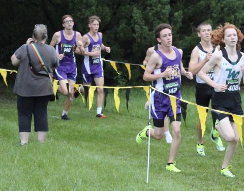 Columbia runner Nolan Martin is followed closely by teammates Nathan Matsubara and Joshua Thompson at the Bobcat Classic on Saturday. (COURTESY)