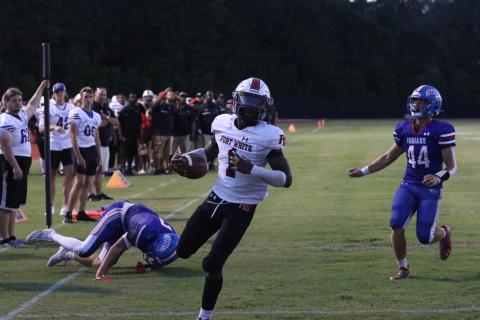 Fort White running back Dakota Fisher takes in a rushing touchdown Friday at Keystone Heights. (MORGAN MCMULLEN/Lake City Reporter)