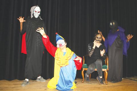 The Creepy Crew featuring Michael Davis as the Oogey ‘Boogey Man,’ Jeremias Sandoval as the ‘Creepy Clown,’ Annika Hunt as ‘Creepy Doll Face’ and Keptia Josma as ‘The Alien,’ will serve up frights and scares at the Columbia High School theatre’s program presentation of Scary Stories on Friday and Saturday night. (TONY BRITT/Lake City Reporter)