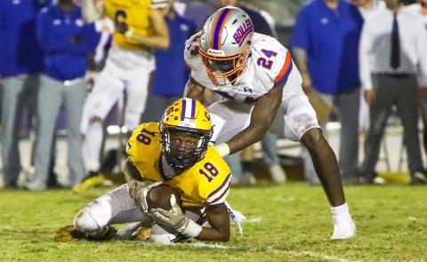 Columbia receiver Marlin Haywood makes a diving catch on fourth down to keep the game-winning drive alive against Bolles last Friday. (BRENT KUYKENDALL/Lake City Reporter)