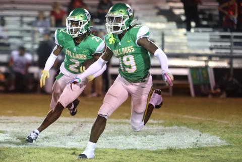 Suwannee defensive back Amarion Rojas (2) returns a kickoff as defensive back Jadarius Horne (19) blocks against Santa Fe last Friday. (PAUL BUCHANAN/Special to the Reporter)