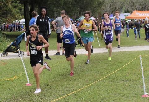 Columbia runner Nolan Martin (second from right) competes at the New World Fall Spectacular. (COURTESY)