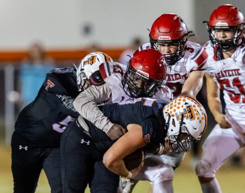 Lafayette safety Blake Pilkington makes a tackle against Trenton last Friday. (JACK HOWDESHELL/Special to the Reporter)