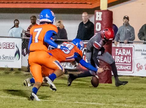 Lafayette quarterback Tywan Williamson can’t track down a loose ball in the end zone, resulting in a safety for Taylor County on Tuesday. (JACK HOWDESHELL/Special to the Reporter)