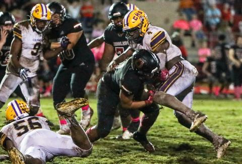 Columbia defensive end Au’vontae Smith makes a tackle against Middleburg on Friday. (BRENT KUYKENDALL/Lake City Reporter)