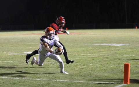 Branford receiver Austin Malaguti stretches across the goal line for a touchdown Friday against Hamilton County. (ERIN ROBERTS/Special to the Reporter)