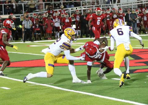 Columbia receiver Camdon Frier horse-collar tackles Vero Beach defensive back Elijah Anderson after Anderson intercepted a pass on Friday. (JORDAN KROEGER/Lake City Reporter)
