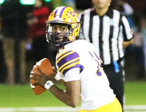 Columbia quarterback Xavier Collins drops back to pass against Vero Beach last Friday. (JORDAN KROEGER/Lake City Reporter)