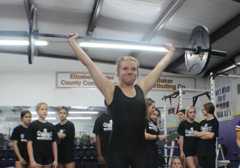Columbia weightlifter Amber Millard completes her clean and jerk during Tuesday's meet. (COURTESY)