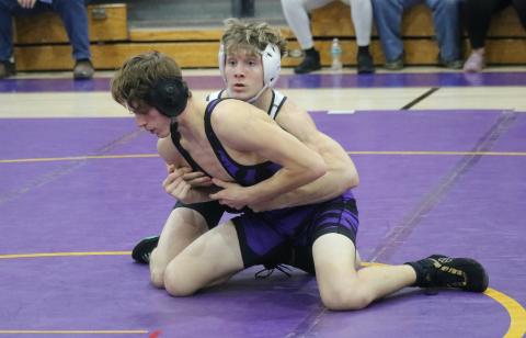 Suwannee's Austin McKinney (right) wrestles against Columbia's Arthur Vanderpool on Thursday night. (JORDAN KROEGER/Lake City Reporter)