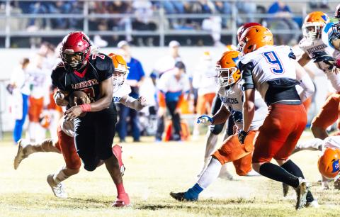 Lafayette running back Jay Ervin runs through the Branford defense during last Friday’s Region 3-1R quarterfinal. (JACK HOWDESHELL/Special to the Reporter)