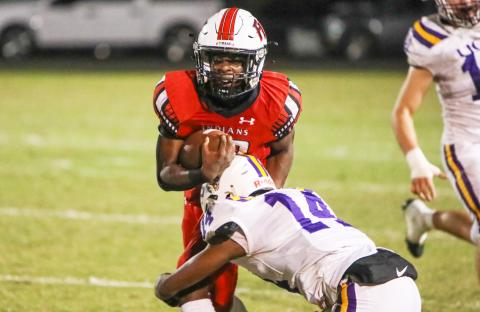 Fort White receiver Najeeb Smith is hit hard by Union County defensive back Bryan Tyson during Friday’s Region 3-1R semifinal. (BRENT KUYKENDALL/Lake City Reporter)