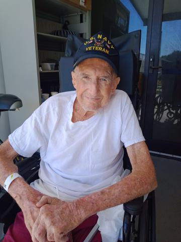 Ervin Seay Williams, who served in the U.S. Navy at Pearl Harbor during World War II, enjoys time with his plants at the Lake City VA Hospital. Williams turns 101 on Monday. (SEAN MCMAHON/Special to the Reporter)