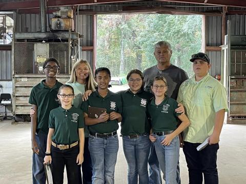 Lafayette County 4-H members that took place in the annual farm judging contest on Oct. 27 include Jaxon Murphy (from left), Lanae Colson, Jayda Hendrick, Lydia Lyons, Tinley Jackson and Justin Swinson Jr. Lafayette County Agriculture and Natural Resources Extension Agent Emily Beach and Lafayette County Extension Director Shawn Jackson are also pictured. (COURTESY)