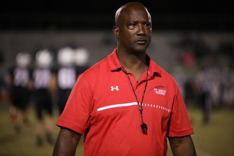 Fort White head coach Demetric Jackson looks on during a game against Ridgeview on Oct. 20. (BRENT KUYKENDALL/Lake City Reporter)