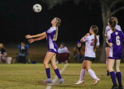 Columbia's Mia Brasel possesses the ball against Fort White on Thursday night. (BRENT KUYKENDALL/Lake City Reporter)