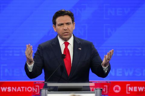 Republican presidential candidate Florida Gov. Ron DeSantis gestures during a Republican presidential primary debate hosted by NewsNation on Wednesday at the Moody Music Hall at the University of Alabama in Tuscaloosa, Ala. (GERALD HERBERT/Associated Press)