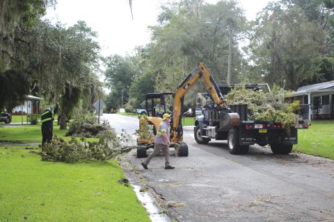 City of Lake City Public Works employees clear a road of debris following Hurricane Idalia’s landfall in late August. The hurricane impacted multiple counties in North Florida, including Lafayette and Suwannee. (TONY BRITT/Lake City Reporter)
