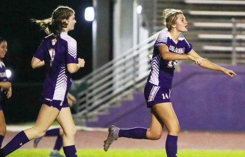 Columbia forward Mia Brasel celebrates one of her goals in the first half of Wednesday night’s District 2-5A quarterfinal against Rickards. (BRENT KUYKENDALL/Lake City Reporter)